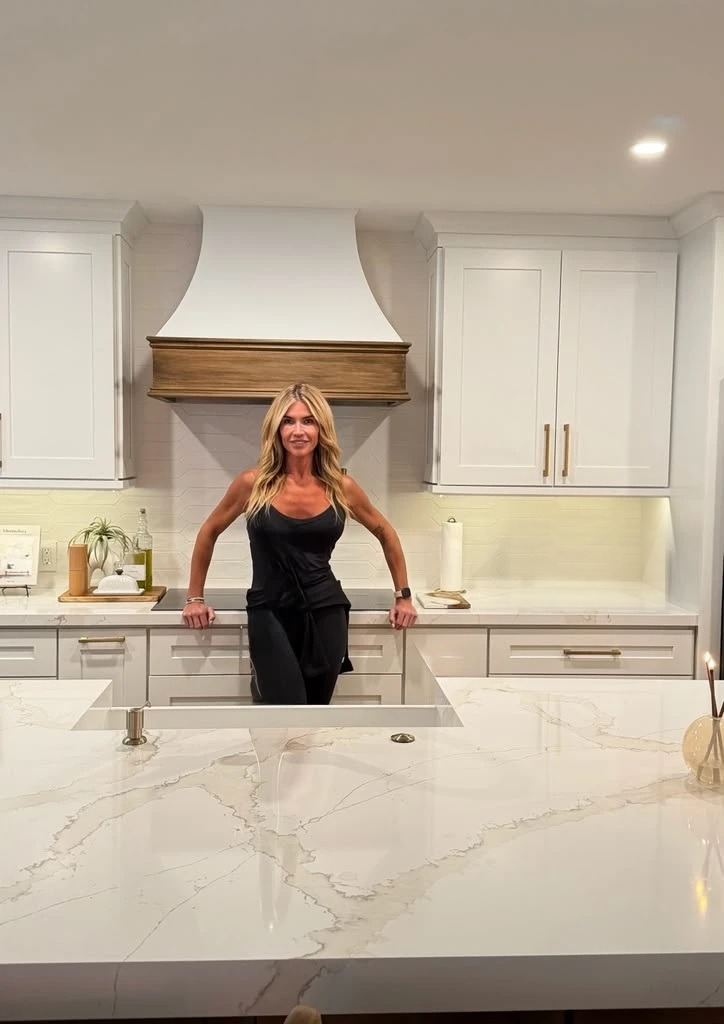 Fiona Rooney standing at a white kitchen island